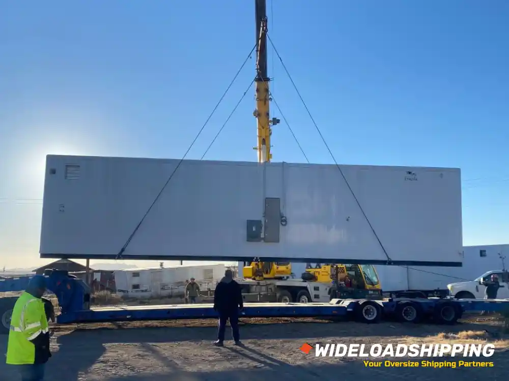 Container being loaded by crane